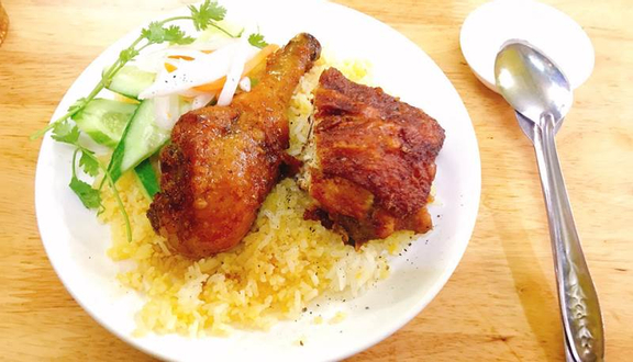 Cơm chiên đùi tỏi + Coca-Cola