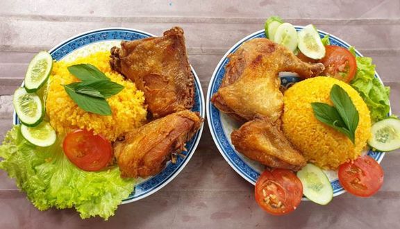 Cơm gà xối mỡ (Đùi lớn) + 1 ly trà đào