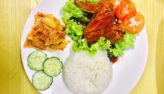 Cơm Đùi Gà Sốt Cay